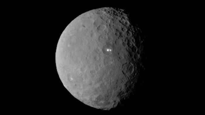This image was taken by NASA's Dawn spacecraft of dwarf planet Ceres on Feb. 19 from a distance of nearly 29,000 miles (46,000 kilometers). It shows that the brightest spot on Ceres has a dimmer companion, which apparently lies in the same basin (Image from nasa.gov)